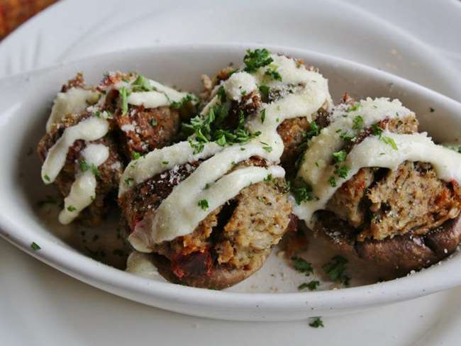 BAKED STUFFED MUSHROOMS (25 each)